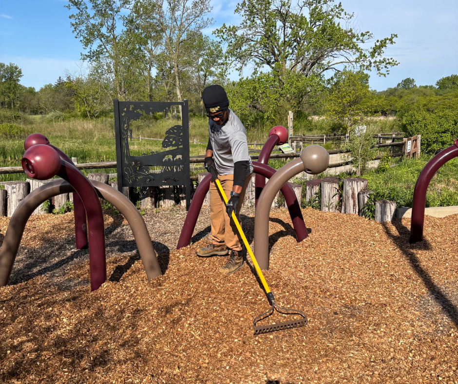 Spreading mulch, park beautification and community service